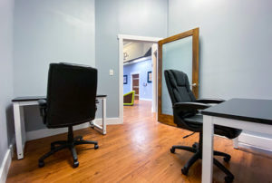 office space for rent with monthly membership fee includes two desks, two chairs & ethernet port
